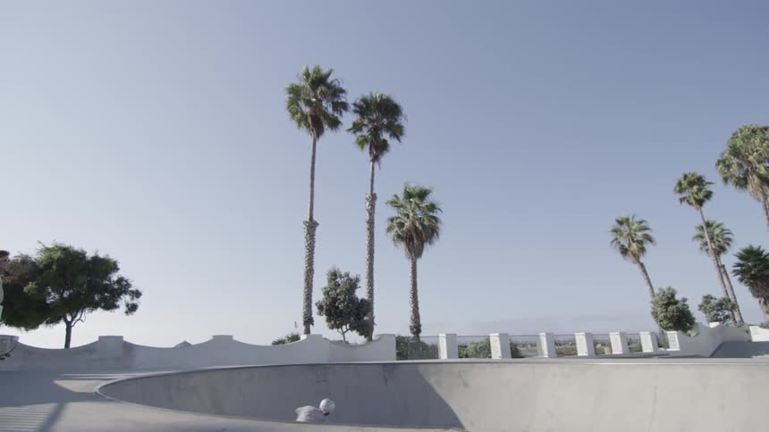 A man rides a bike on a ramp on a sunny day
