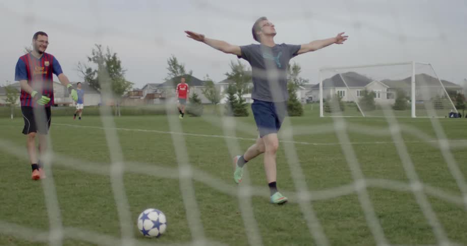 Some friends are playing soccer