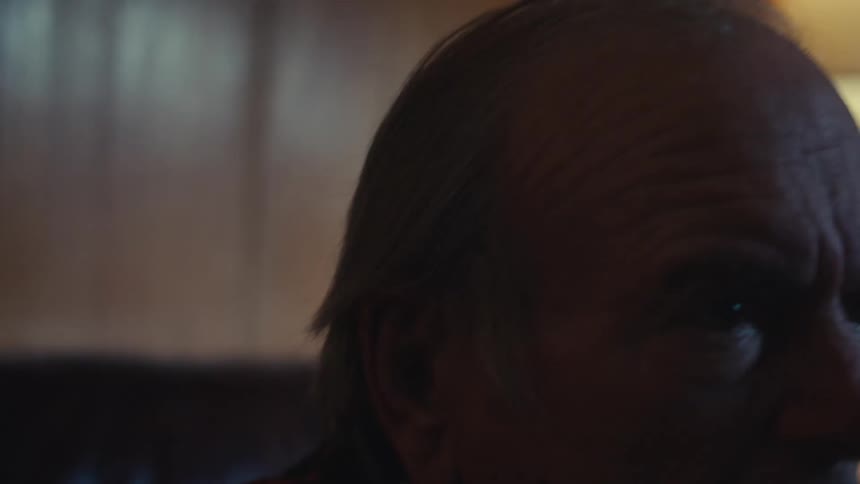 A close up clip of an elderly mans reactions