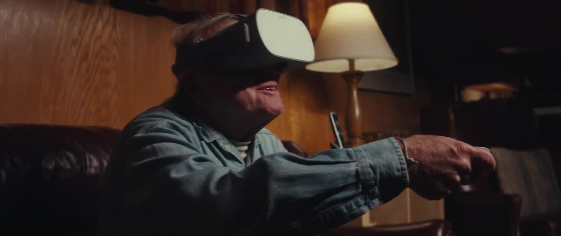 A clip of an elderly man having fun with a virtual reality