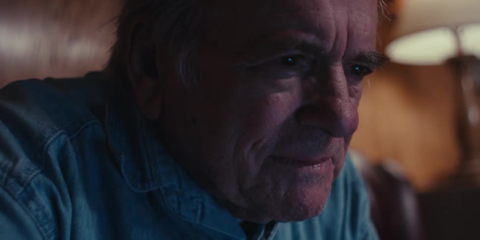 Portrait of an elderly man sitting and concentrating
