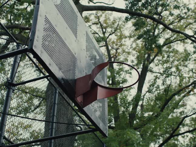 A footage of a blue basketball aimed at the hoop