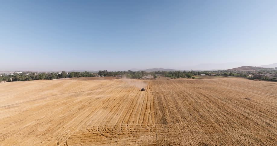 Aerial view of a machine working in an agricultural field