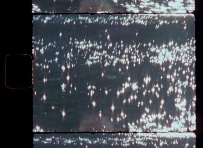 Moving sea water with reflection of the sun