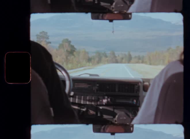 A film clip of two people having a conversation in the car