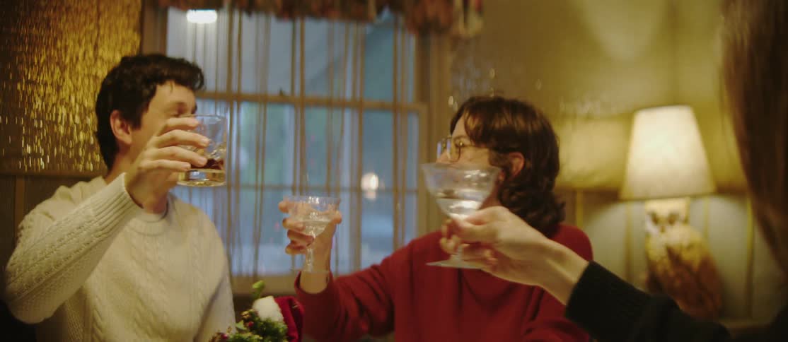 A clip of people sharing a cheers