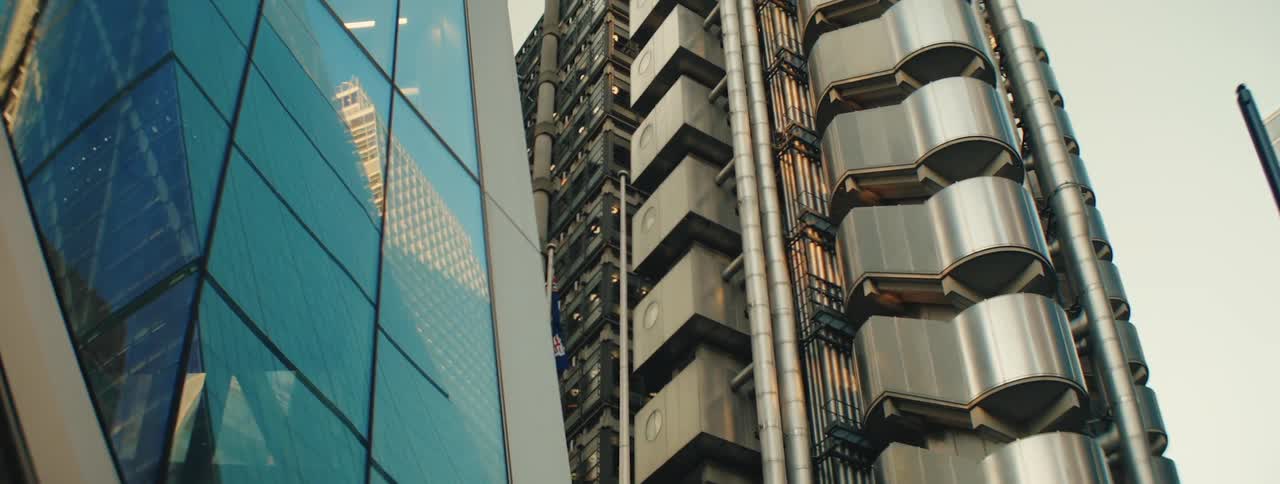A low angle view of the distinctive modern architecture of the lloyds building in london with its exposed pipes and structural elements