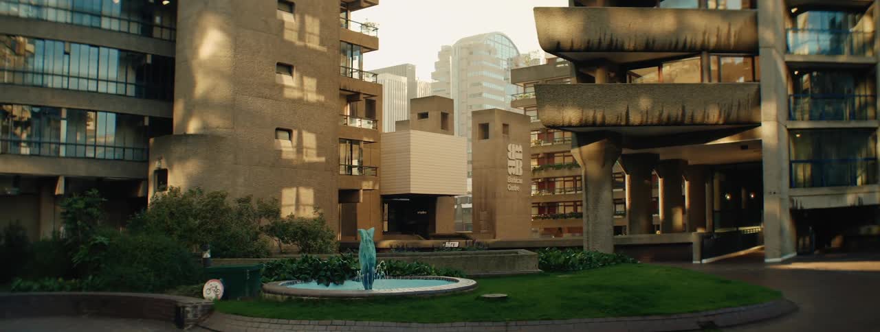Urban buildings in a calm environment with a fountain in the center