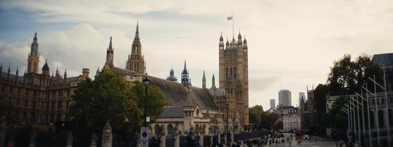 Busy pedestrian street and classic london buildings
