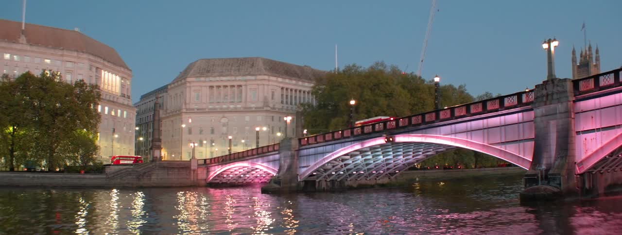 Traffic moves over the bridge in the city