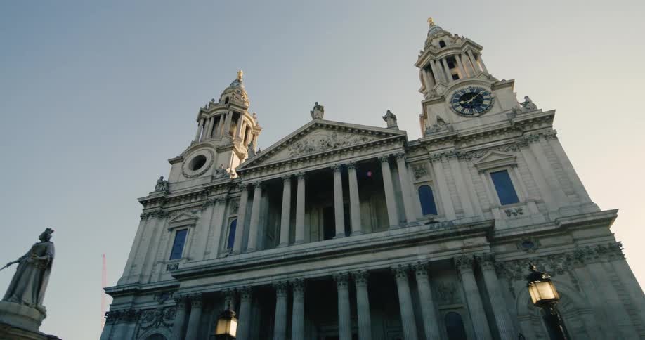 Upward view of the front facade of a classical church