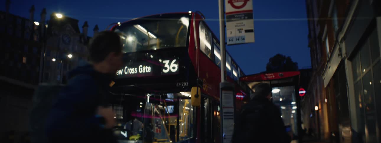 People in the city get on the bus