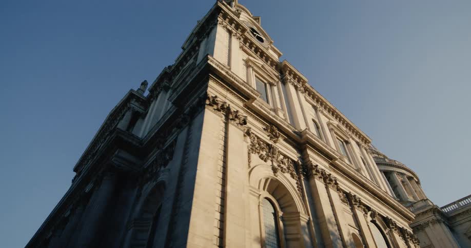 Exterior and classic architecture of a building against a blue sky