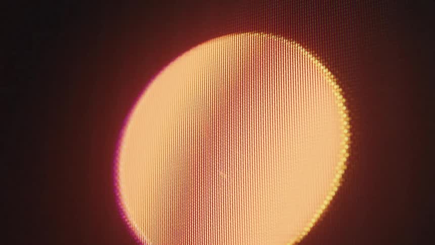 Round red light flashing on a screen
