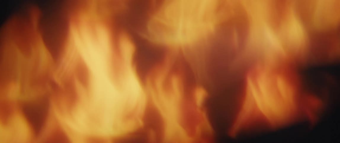 Close up of a screen displaying an abstract fire projection