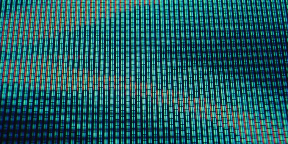 Closeup of a digital screen displaying a screen saver containing a series of lines