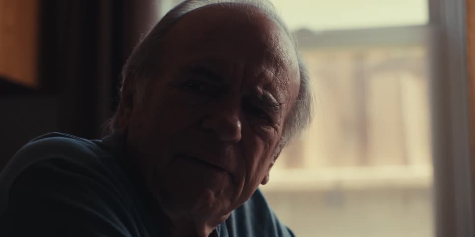 Portrait of an elderly man sitting