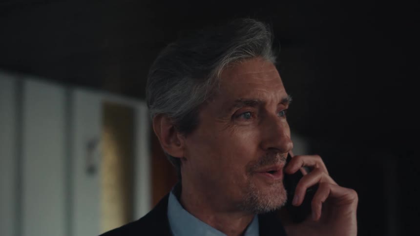 Portrait of a man talking on a phone call