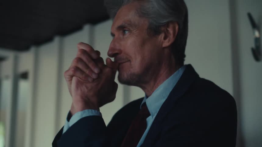 Happy man in suit clapping and walking dancing