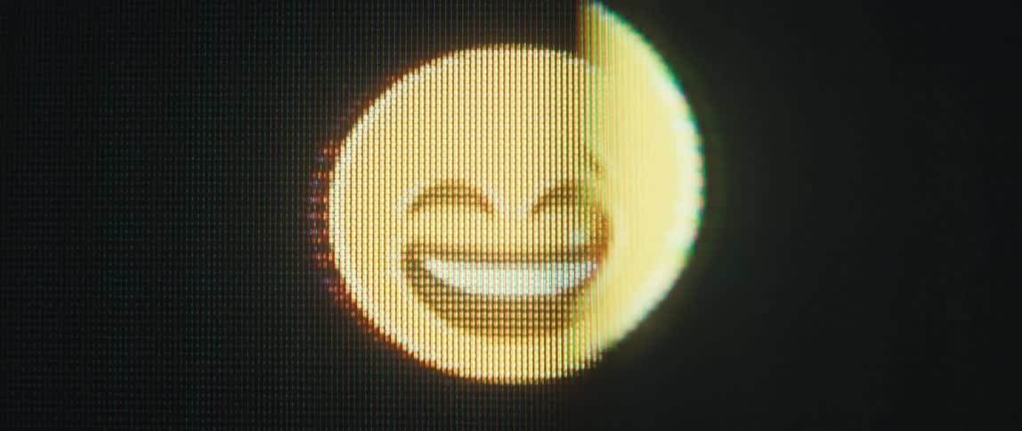 Closeup view of smiling emojis on a digital screen