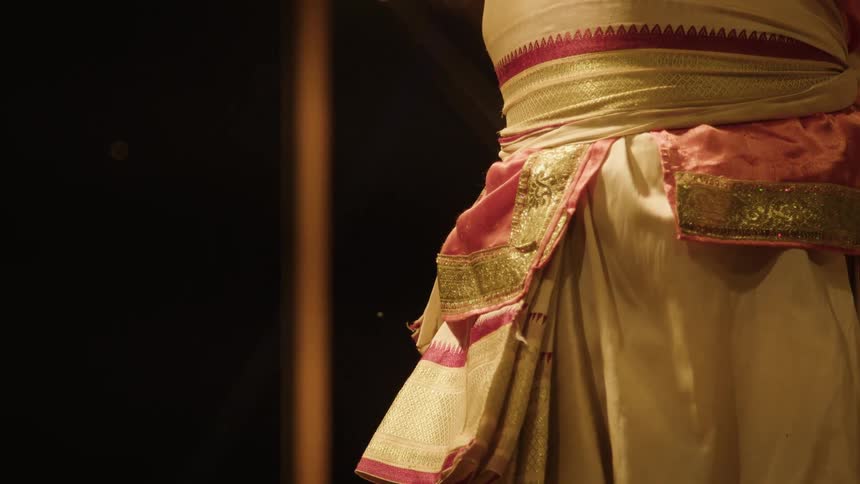 Body of a woman with colorful clothes and skirt