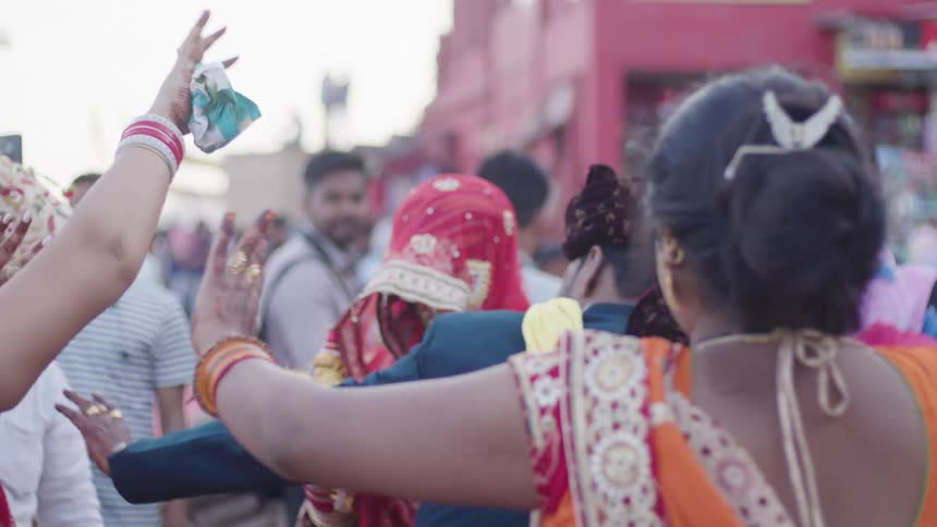 Crowd of people dancing in the streets