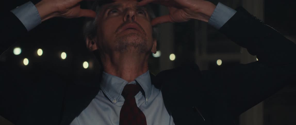 Portrait of a man making a sign of denial and tired