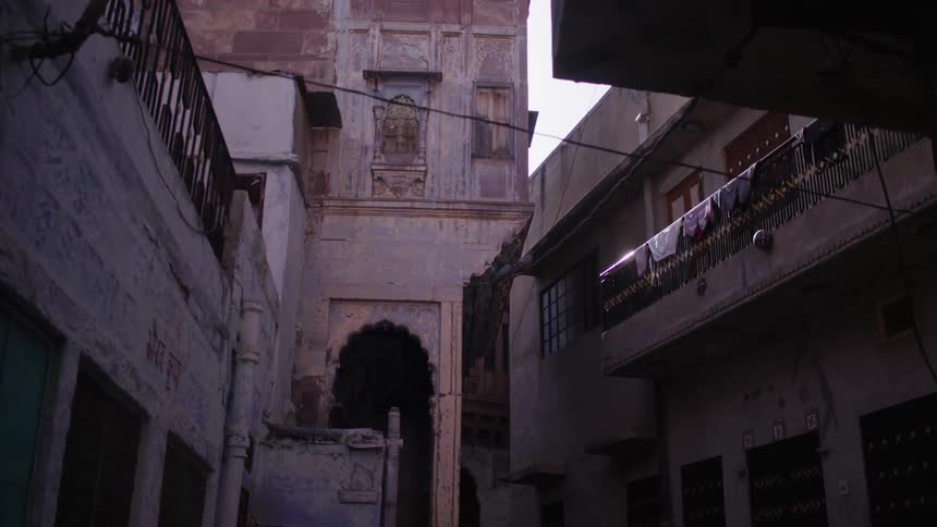 Alley surrounded by classic houses