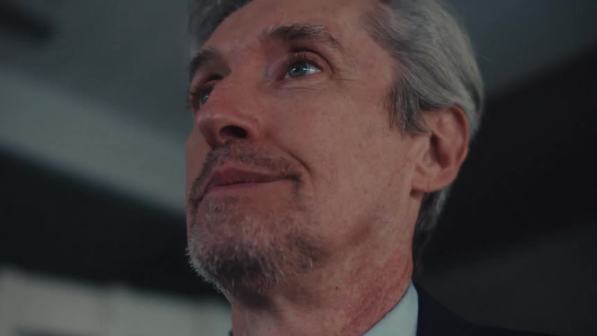A clip of a man surprised and happy