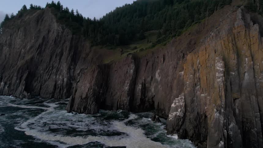 Ocean with waters crashing against the rocky coast