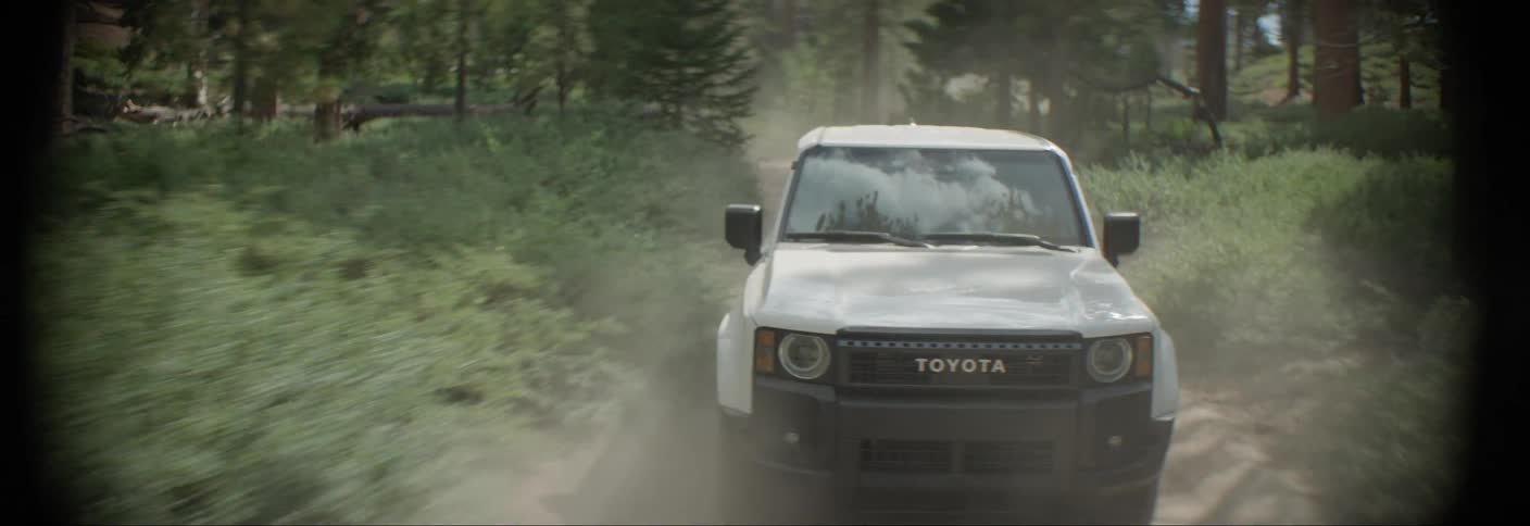 A cli of a truck moving in the woods