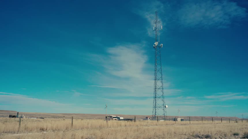 Transmission tower in a vast field