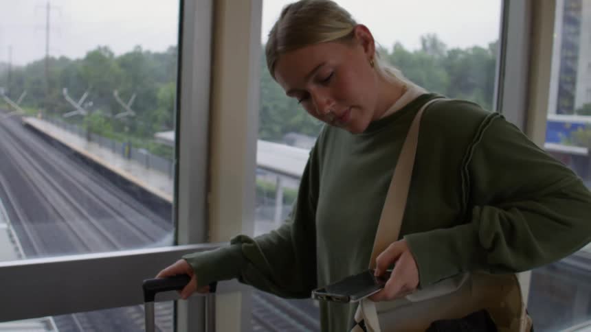 A clip of a lady walking at the terminal
