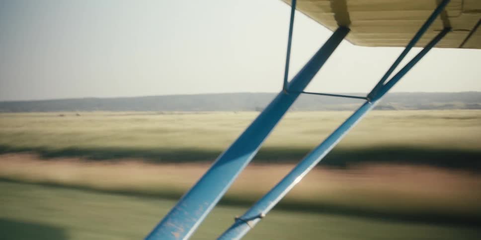 Airplane traveling along a runway preparing to take off