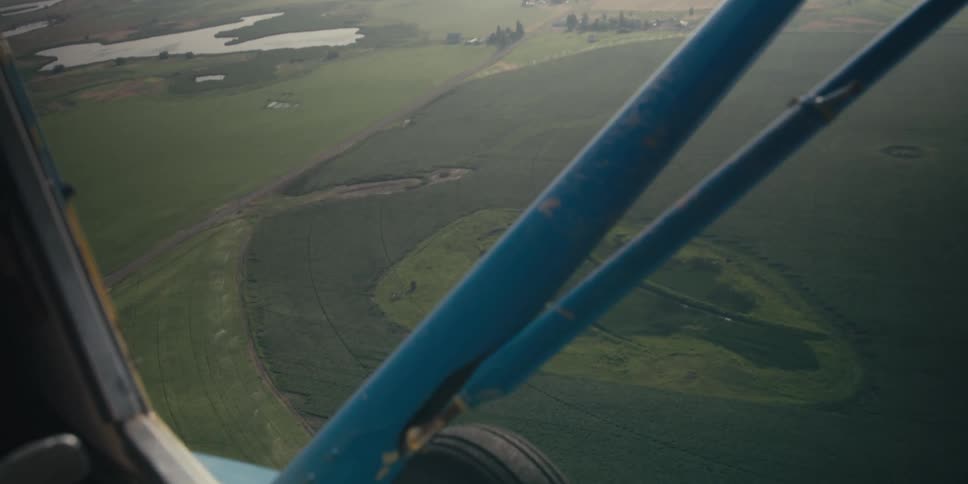 View of farmlands from a low-flying plane