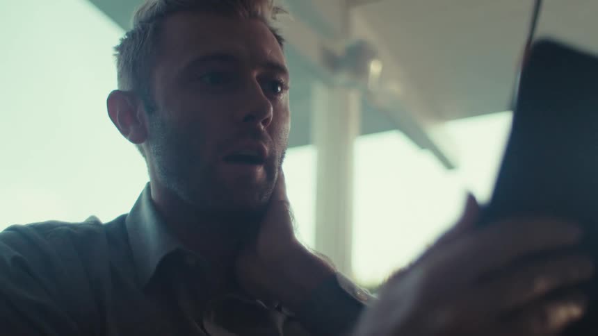 A man is talking on his cell phone