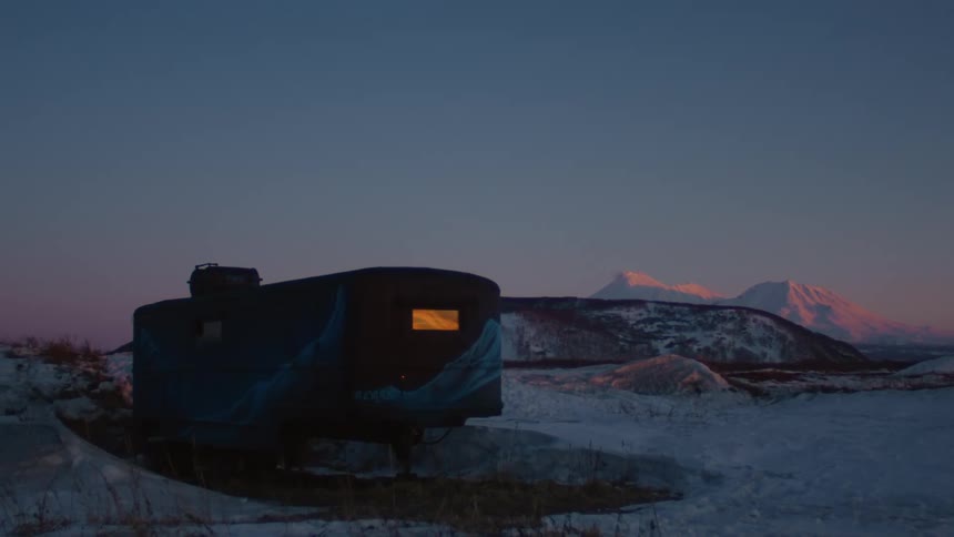 A trailer in the arctic at dusk