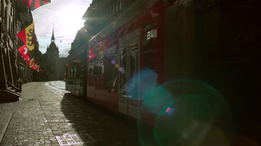 Tram passing through the middle of a classic city