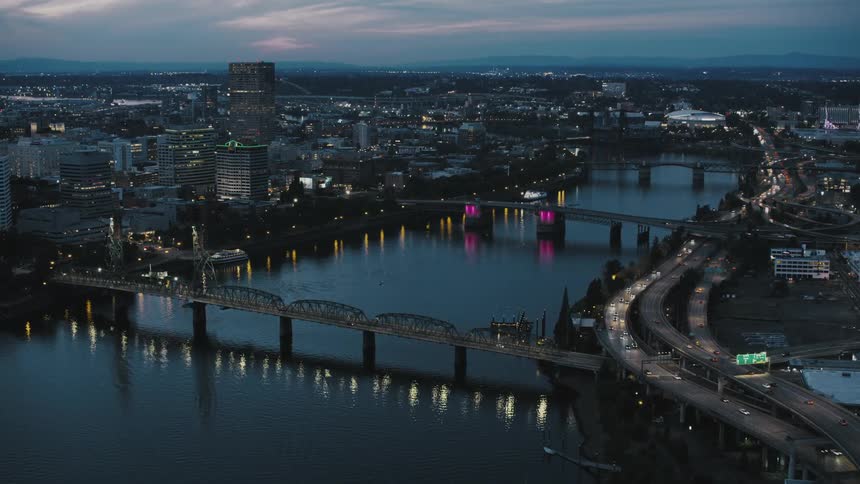 Aerial view of a sea canal in the middle of an urban city with bridges