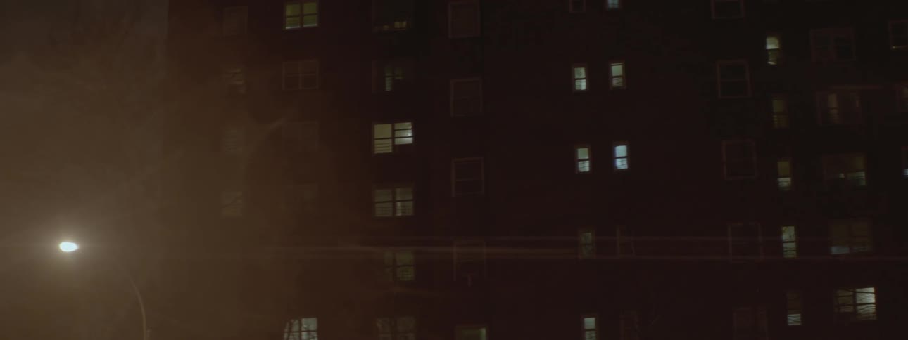 Apartment windows are light up at night