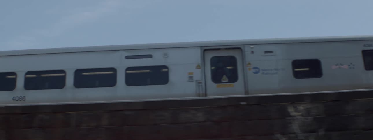 City train moving through city in the fall