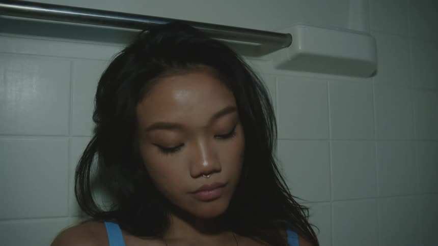 Portrait of a young woman in an indoor space