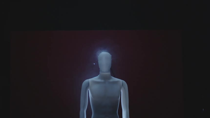 The animation is of a figure of a person that is standing still and glowing