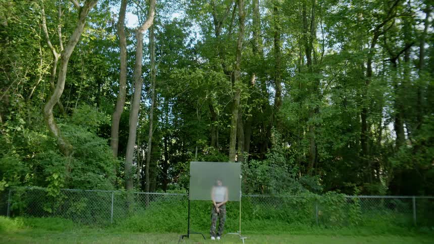 A clip of a lady in the forest