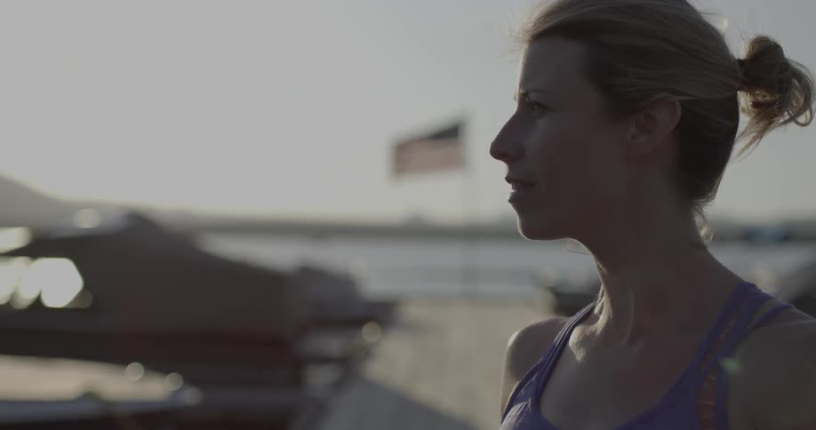 A woman stares out into the distance