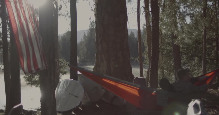 People resting in a hammock