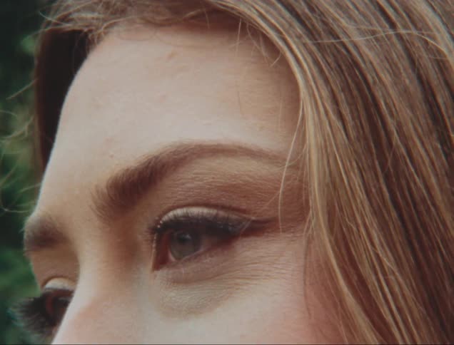 Side closeup of a blonde womans face