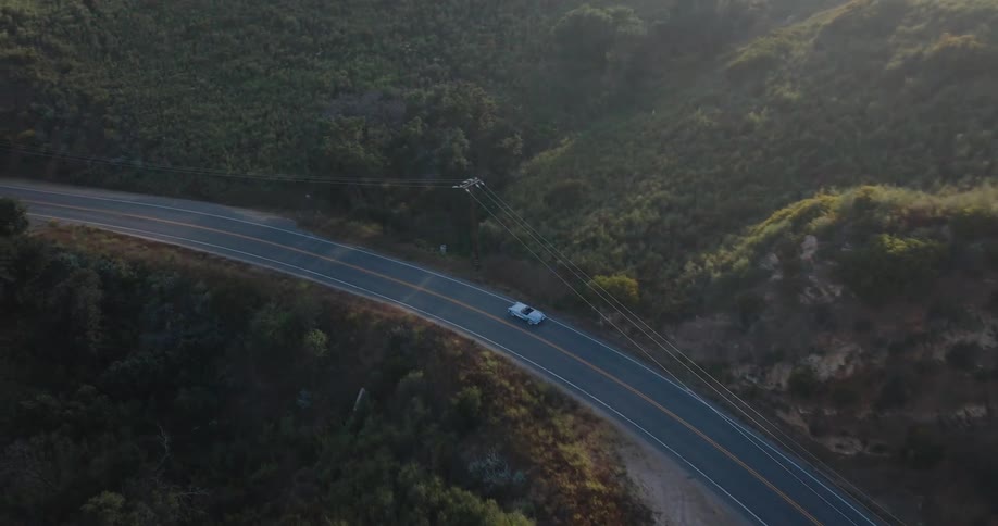 An aerial clip of a car moving on the freeway
