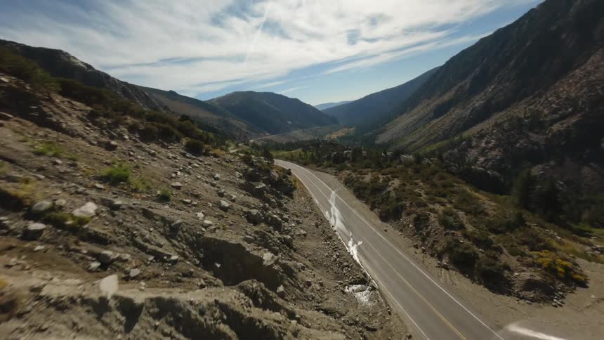 Aerial view of a highway amidst mountains