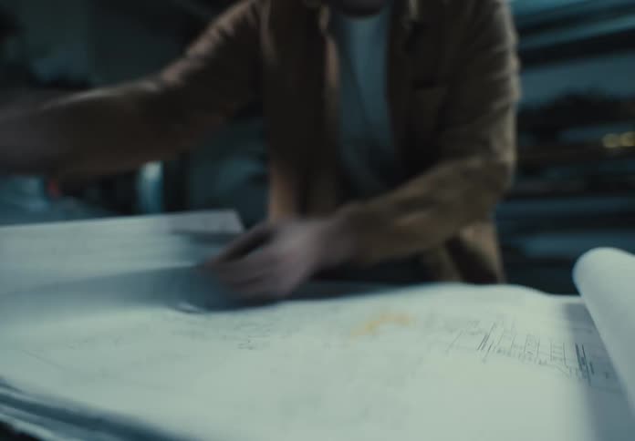 Male engineer drawing a project on the table